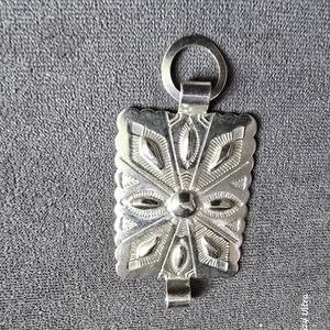 Stamped Floral Motif Silver Pendant